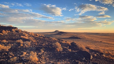 brown and green mountain under blue sky during daytime