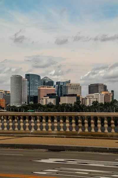 a view of a city from across a bridge