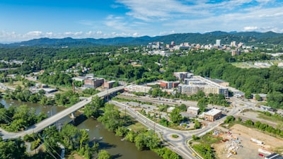 An aerial view of a city with a river running through it