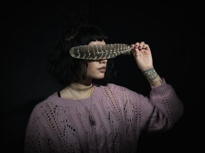 woman in brown knit sweater