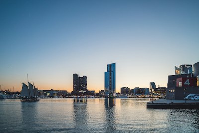 city skyline across body of water during daytime