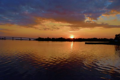 body of water during sunset
