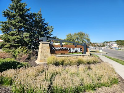 Downtown shawnee sign with landscaping and landscaping
