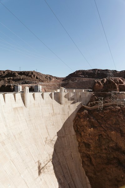 a view of a dam in the middle of the desert