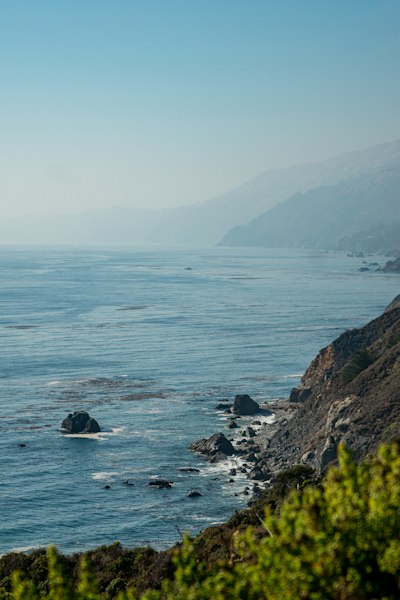 a view of the ocean from a cliff