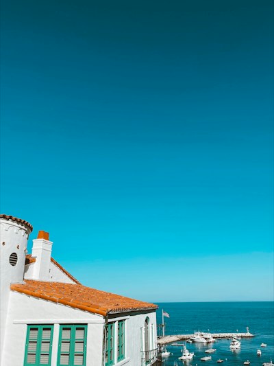 a view of the ocean from a roof of a building