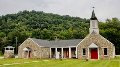 a church with a steeple and a steeple on top of it