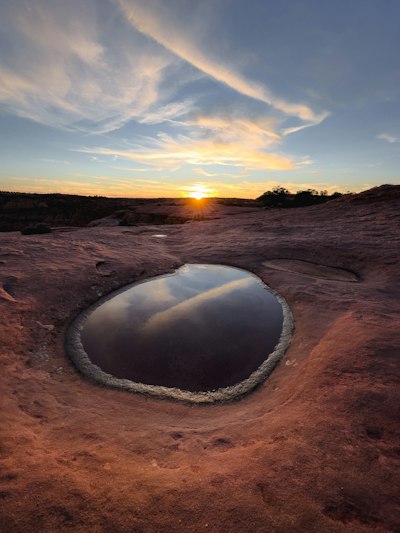 a large rock on a beach