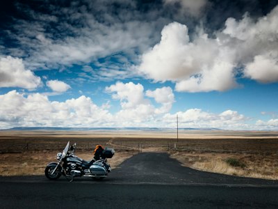 black touring motorcycle on road