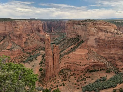 brown rock formation under blue sky during daytime