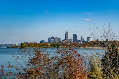 city skyline across body of water during daytime