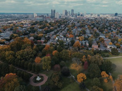an aerial view of a city with lots of trees