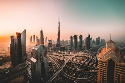 The Burj Khalifa and skyscrapers above a multi-level highway interchange in Dubai