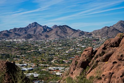 a view of a city from the top of a mountain