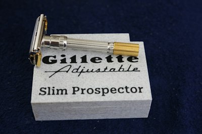 A vintage gillette adjustable slim prospector razor on its box