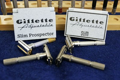 Four gillette adjustable slim razors with their original boxes