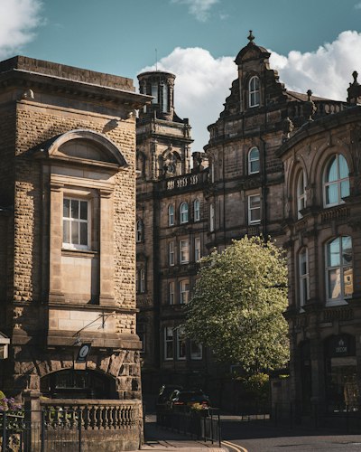 a large building with a clock on the front of it