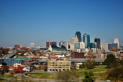 city buildings under blue sky during daytime