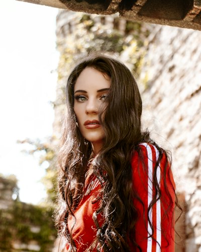 woman in red and black jacket