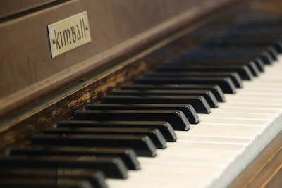 Close-up of an old kimball piano keyboard