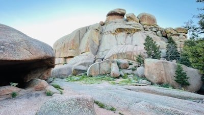 a large rock formation with a cave in the middle of it