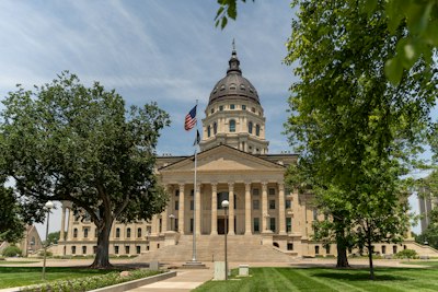 A large building with a flag on top of it