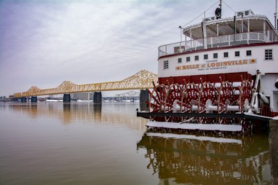 red and white ship on water