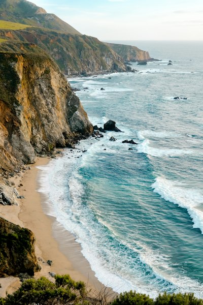a view of the ocean from a cliff