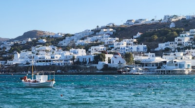 a boat floating on top of a body of water