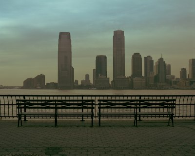 a city skyline across a body of water