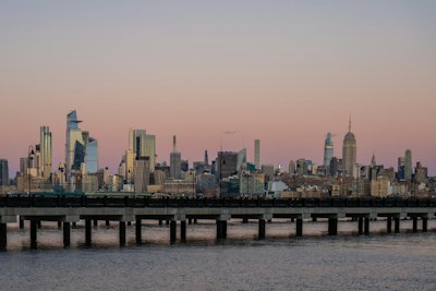 A large body of water with a city in the background