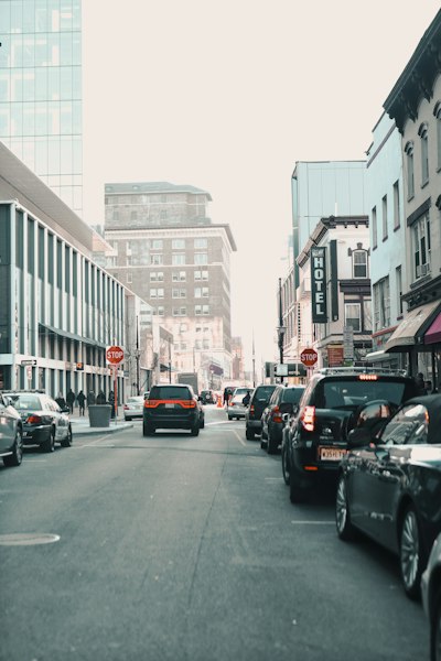 cars parked on side of the road during daytime
