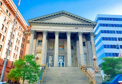 a building with columns and a staircase