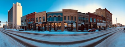 panoramic photography of a brown concrete building front
