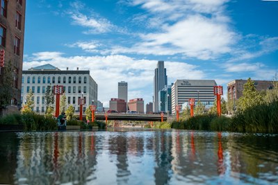 a body of water surrounded by tall buildings