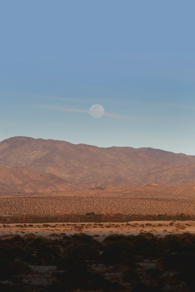 brown mountains under blue sky during daytime