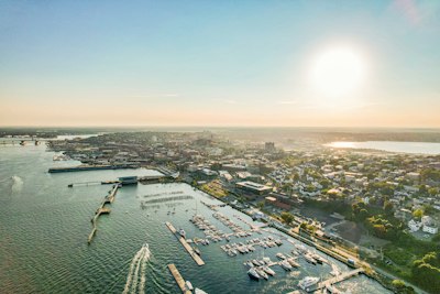 an aerial view of a marina with boats in the water