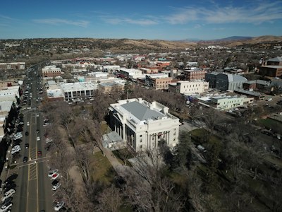 an aerial view of a city with tall buildings