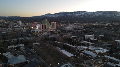 a view of a city with mountains in the background