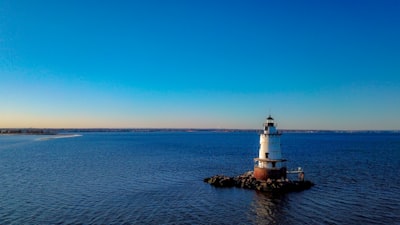 a lighthouse on a small island