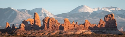 brown rocky mountain under blue sky during daytime