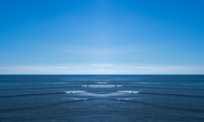 a view of the ocean from the shore line