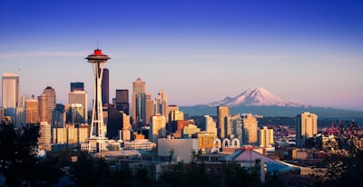 The Space Needle and Seattle skyline with Mount Rainier in the distance