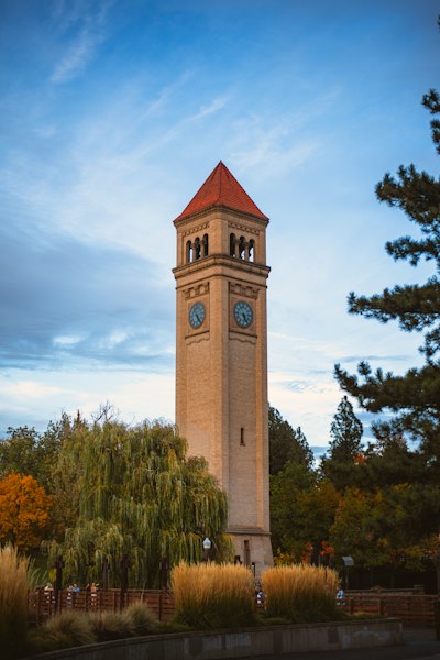 A tall tower with a clock on the top of it