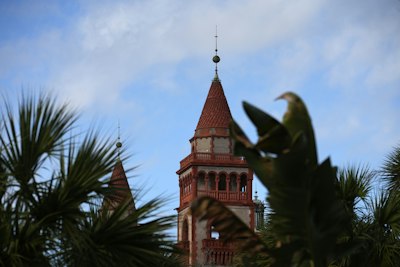 a tall tower with a clock on the top of it