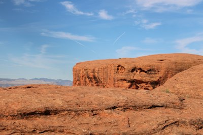 a rock formation with a face carved into it