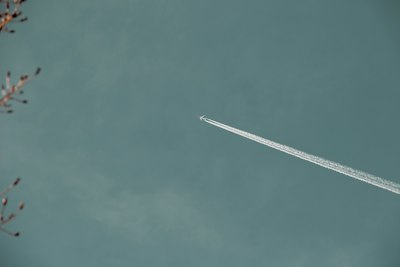 white plane in the sky