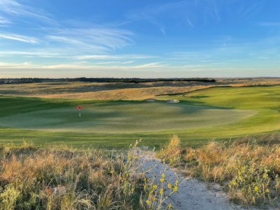 a view of a golf course from a distance