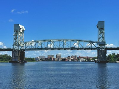 A large bridge spanning over a large body of water