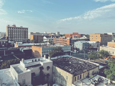 A view of a city from the top of a building